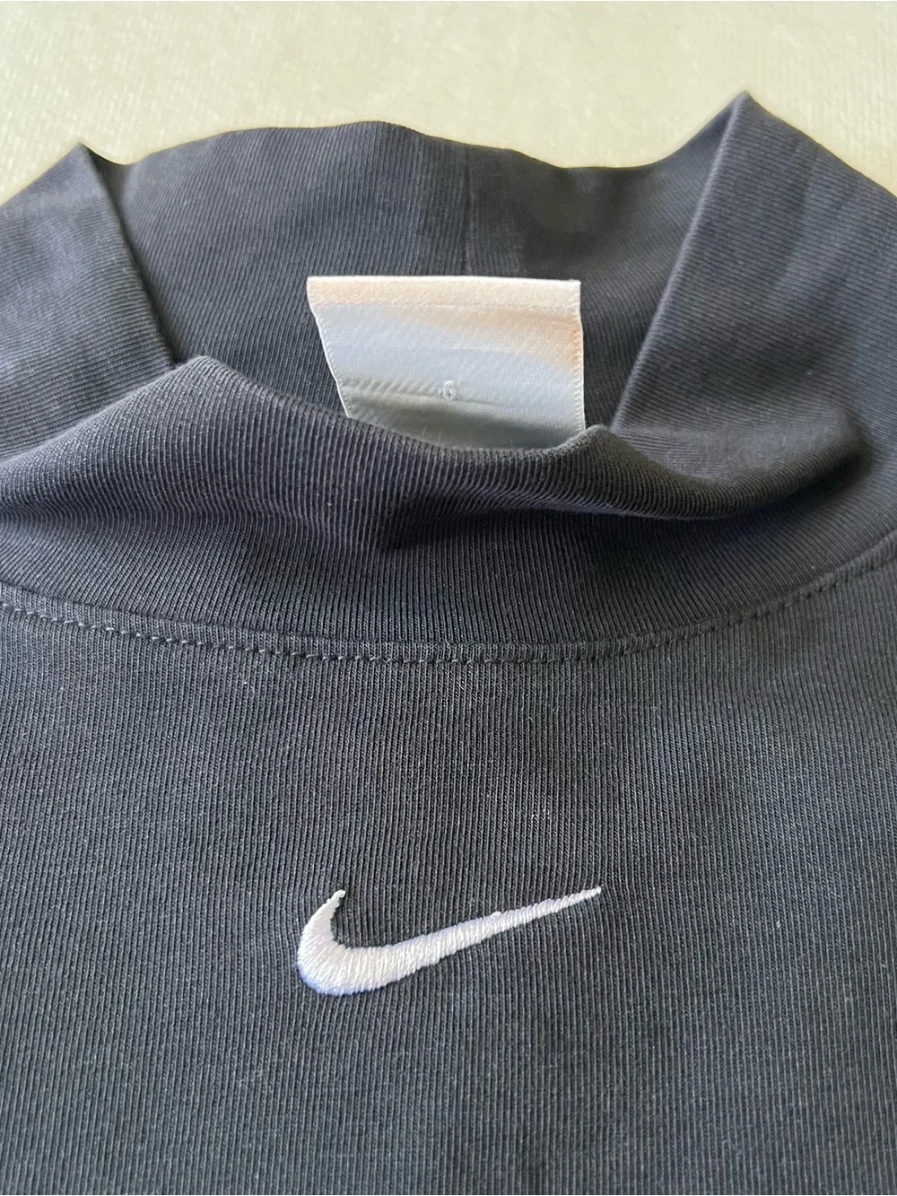 Nike Black Mock Neck Long Sleeve Top with White Swoosh Center Logo Athlete